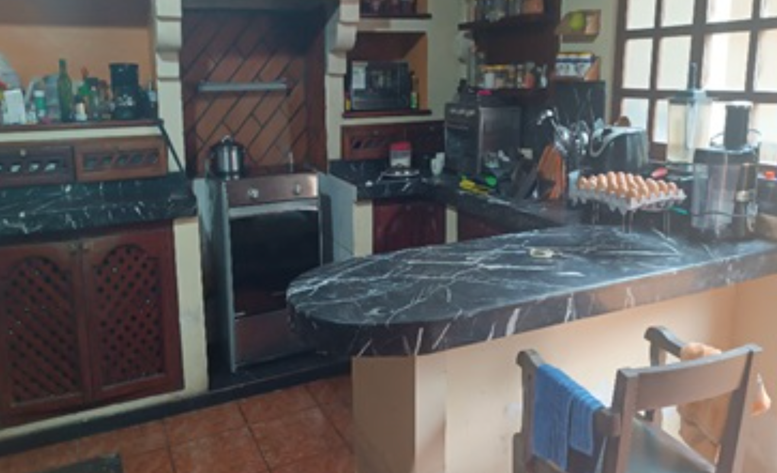 EC-RJ-158425 — Cocina de la vivienda Cocina de la vivienda con muebles y mesón