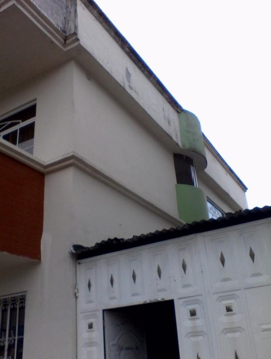 EC-RJ-158178 — Vista lateral y acceso al garaje — Ciudadela del Magisterio, Santo Domingo Vista lateral de la casa y acceso al garaje en la Ciudadela del Magisterio